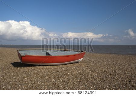Red Boat On Dunwich Beach, Suffolk, England