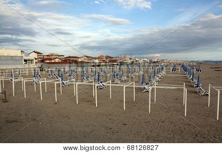 VIAREGGIO, ITALY - MAY 01: Typical Italian beach chairs in Viareggio, one of the most well known summer Italian vacation spots, on May 01,2014, Viareggio, Italy