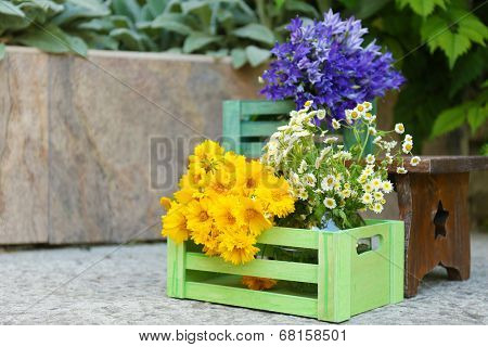 Garden decoration with wildflowers, outdoors