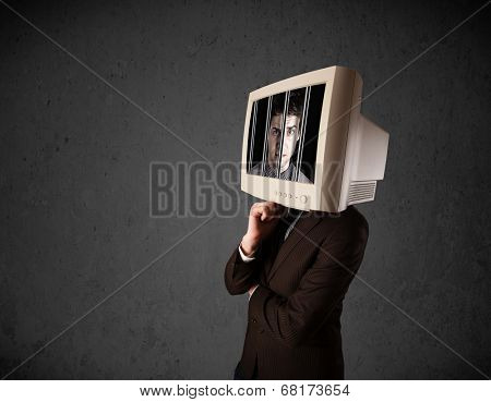 Business man with monitor screen on his head traped into a digital system concept