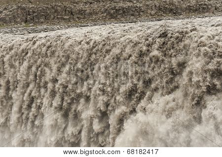 Detail of water from Detifoss waterfall. Dettifoss is the most powerful waterfall on Iceland and in the whole Europe.