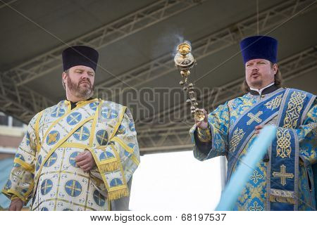 TIKHVIN, RUSSIA - JULY 9, 2014: Unidentified participants Orthodox divine Liturgy on the occasion celebrations of the 10th anniversary of the return of the Tikhvin icon of the Mother of God.