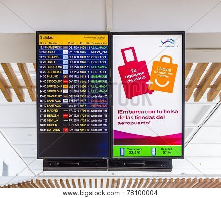 Flight Information Display Screen Board At Airport Of Arrecif