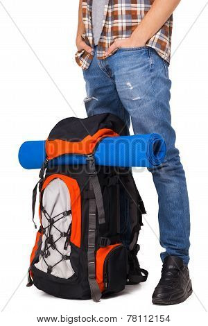 Hiker standing with knapsack