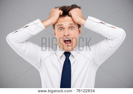 Man tearing his hair
