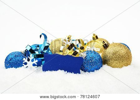 Blue,golden Christmas Decoration In Line On Snow With Wishes Card