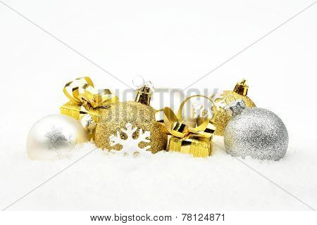 Golden,silver Christmas Decoration On Snow