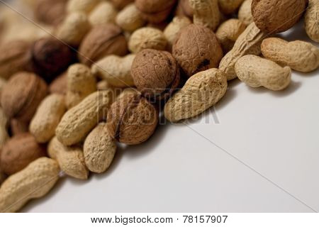 Heap Of Peanuts And Walnuts