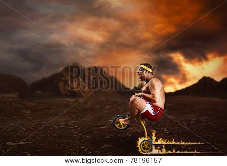 Adult crazy man cycling on child's bicycle
