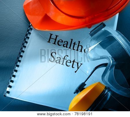 Goggles, Earphones And Red Helmet In Closeup