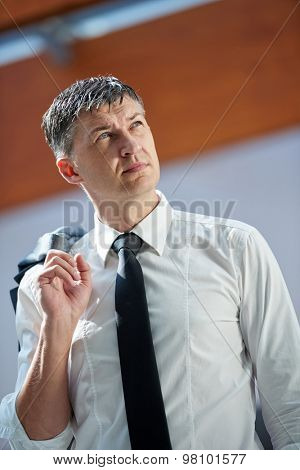 business man using phone at modern office space