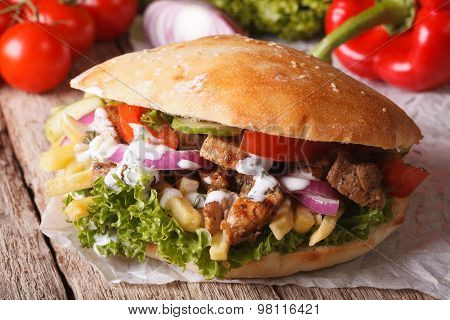 Appetizing Sandwich: Doner Kebab Close-up On The Table. Horizontal