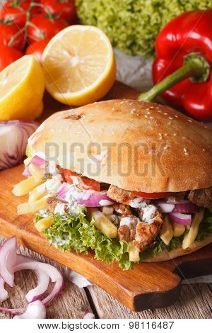 Doner Kebab With Meat And Vegetables Closeup. Vertical