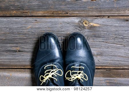 italian leather shoes concept: boots laced with spaghetti