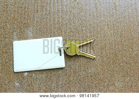 Key Card Holder On Tile Background