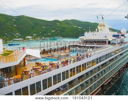Road Town, Tortola, British Virgin Islands - February 06, 2013: Cruise ship Mein Schiff 1 docked in port Caribbean at Road Town, Tortola, British Virgin Islands on February 06, 2013