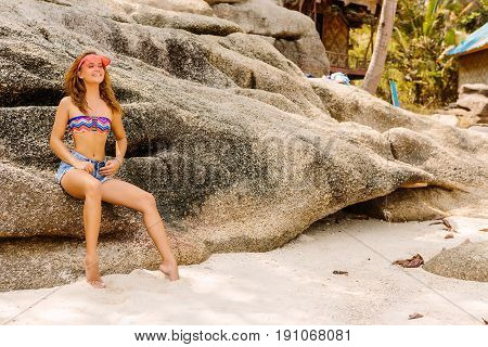 Beautiful Woman On Big Stone In Tropics.