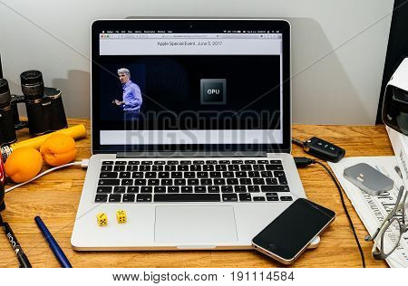 PARIS FRANCE - JUNE 6 2017: Apple Computers website on MacBook laptop in creative environment showcasing Apple Craig Federighi previews macOS High Sierra at WWDC 2017 - new gpu in laptops for better rendering
