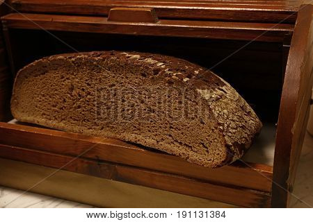 Half Of Black Rye Artisan Bread Loaf