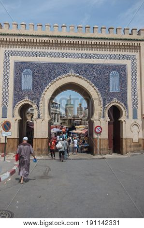 Fez, Morocco - May 9, 2017: Bab Bou Jeloud the Blue Gate the main gated entrance to the old UNESCO protected Medina of Fez El Bali a world heritage site Northern Morocco