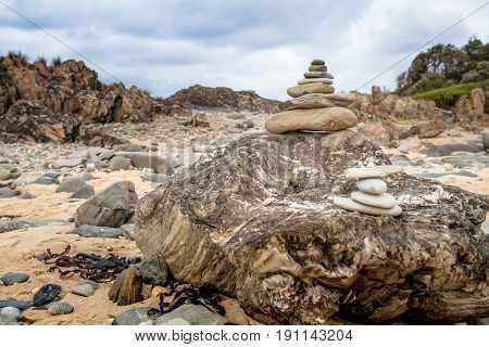 Stone pebble cairn in the beach. Zen concept.