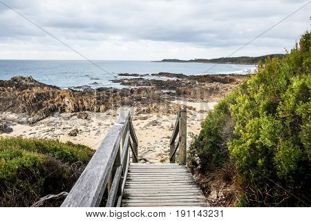 Wooden runway to access to the beach.