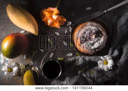 Tea party still ife with fruits and flowers horizontal