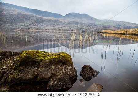 A Beautiful Irish Mountain Landscape With A Lake In Spring. Gleninchaquin Park In Ireland.