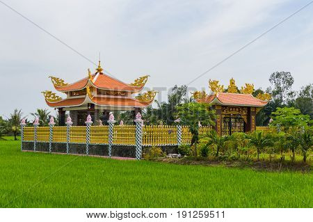 Chinese Architecture In The Rice Field