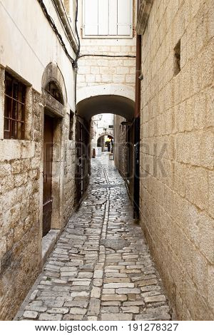Narrow Pathway In Old Unesco Town - Croatia Trogir
