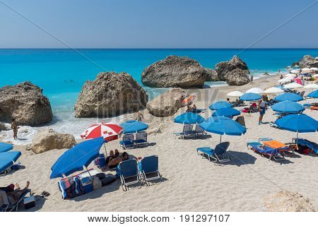 MEGALI PETRA BEACH, LEFKADA, GREECE JULY 16, 2014: Panoramic view of blue waters of Megali Petra Beach, Lefkada, Ionian Islands, Greece