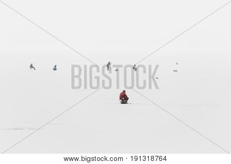 Fishermen on the river. Winter fishing on the Volga