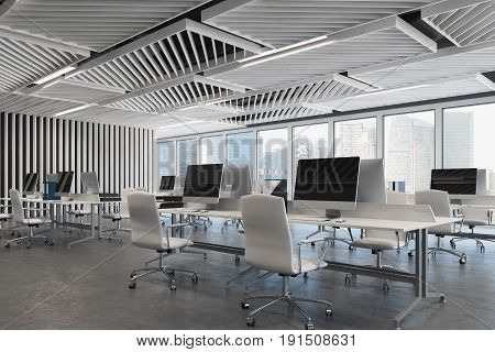 Open space office close up with gray wooden walls concrete floor and two rows of computer tables along a wall and a panoramic window. 3d rendering mock up