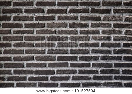 The old black brick wall texture background