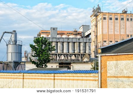 Plant for the production of baked goods. Elements of the facade of the production building. Factory background
