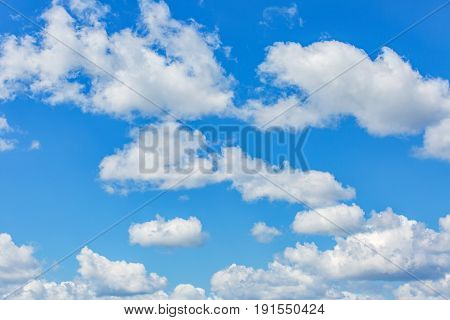 Photo of cloudy blue sky in summertime