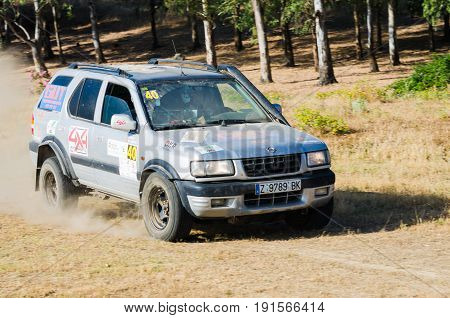 EXTREMADURA SPAIN - JUN 17: Driver and codriver Participing in TT Spanish Rally Championship. Badajoz Dehesa de Extremadura.
