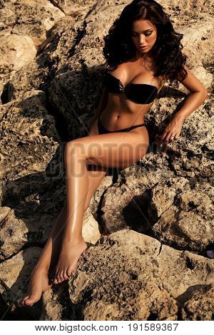 Sexy Woman With Long Dark Curly Hair Wearing Bikini And Beach Clothes