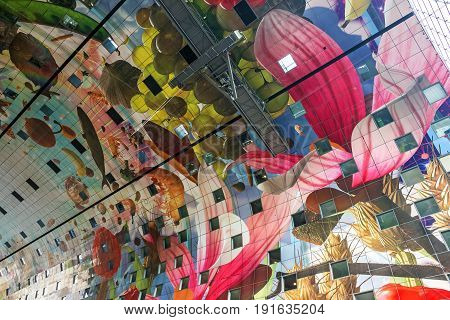 ROTTERDAM, THE NETHERLANDS - MAY 12 2017: Colorful ceiling decoration of the new Market Hall located in the Blaak district Rotterdam The Netherlands