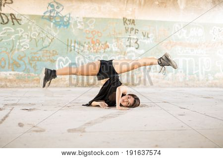 Female Dancer Doing A Leg Split