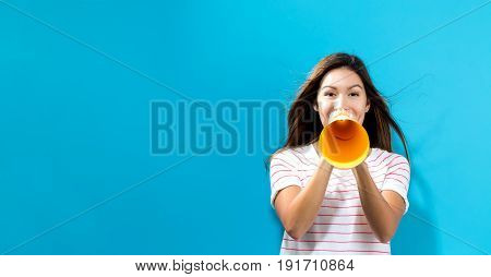 Young Woman Holding A Paper Megaphone