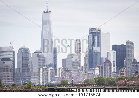 US Marine Corps Ironhorse 01 H-461 helicopter flies above Ellis Island on the Hudson River during the Parade of Ships for Fleet Week New York, JERSEY CITY NJ MAY 24 2017.