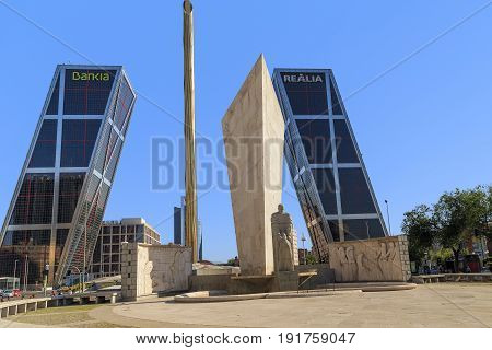 MADRID, SPAIN - MAY 24, 2017: The Gate of Europe is the first inclined skyscrapers in the world between which an obelisk and a monument to the politician Jose Calvo Sotelo are installed.