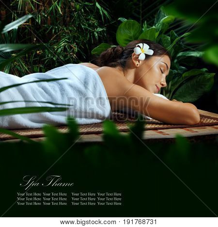 portrait of young beautiful woman in spa environment. banner, space for text.