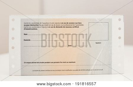 PARIS FRANCE - OCT 26 2016: Rear view of vehicle registration certificate (certificate d'immatriculation known also as carte grise)