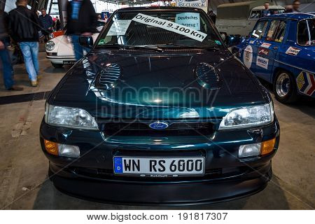 STUTTGART GERMANY - MARCH 03 2017: Rally special car Ford Escort RS Cosworth 1993. Europe's greatest classic car exhibition 