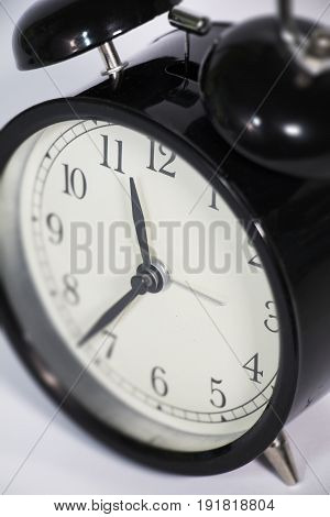 Black, Vintage Alarm Clock With Qwhite Background