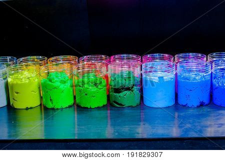 ink or paint for printing on fabric there are several types. The ink used for printing on dark fabric always use plastisol ink. it useful for white fabric too
