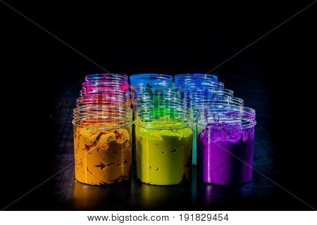 ink or paint for printing on fabric there are several types. The ink used for printing on dark fabric always use plastisol ink. it useful for white fabric too