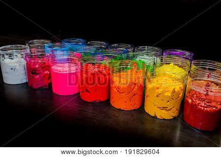 ink or paint for printing on fabric there are several types. The ink used for printing on dark fabric always use plastisol ink. it useful for white fabric too